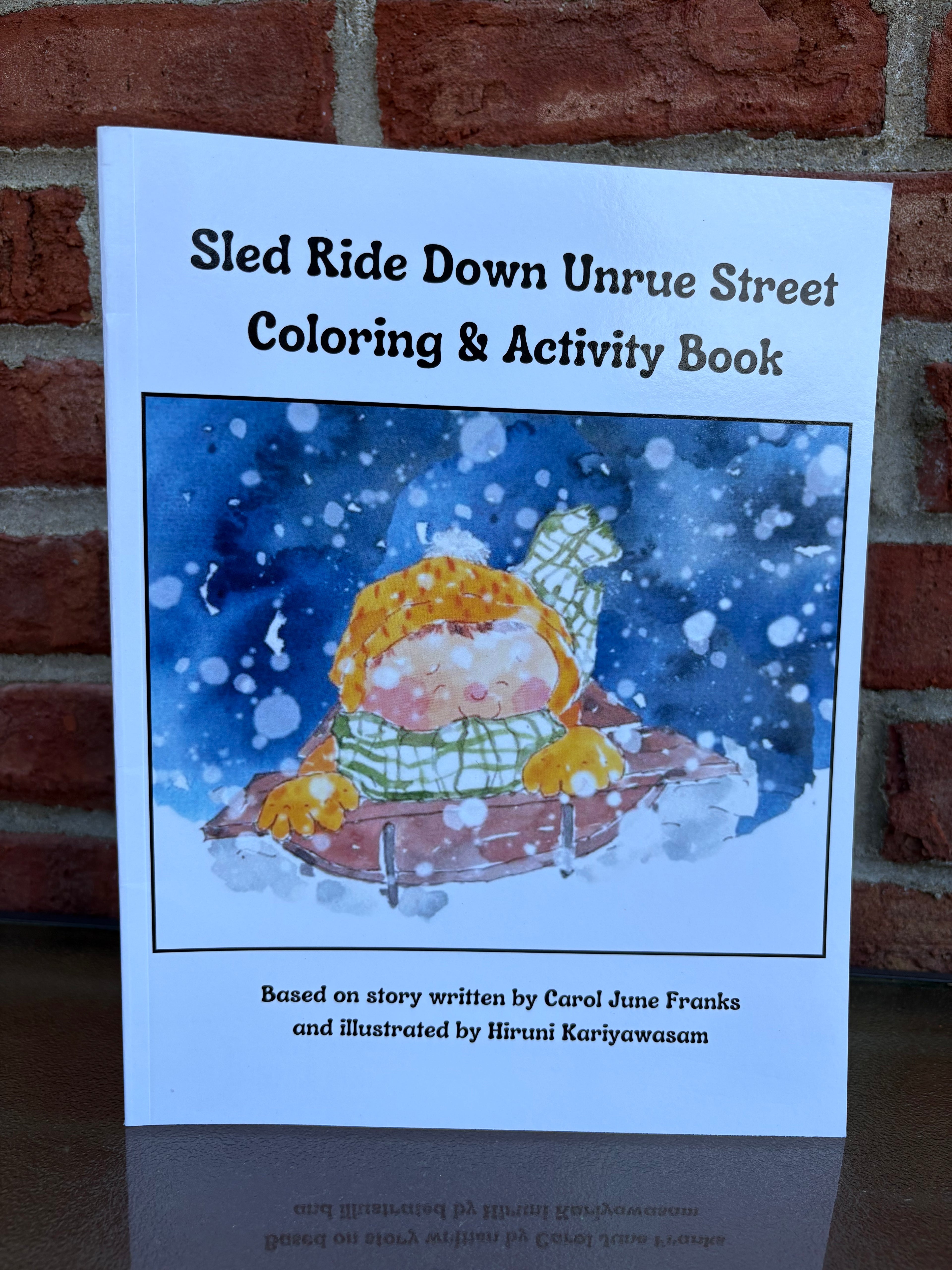 Sled Ride Down Unrue Street Coloring & Activity Book