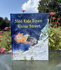 Sled Ride Down Unrue Street HARDCOVER